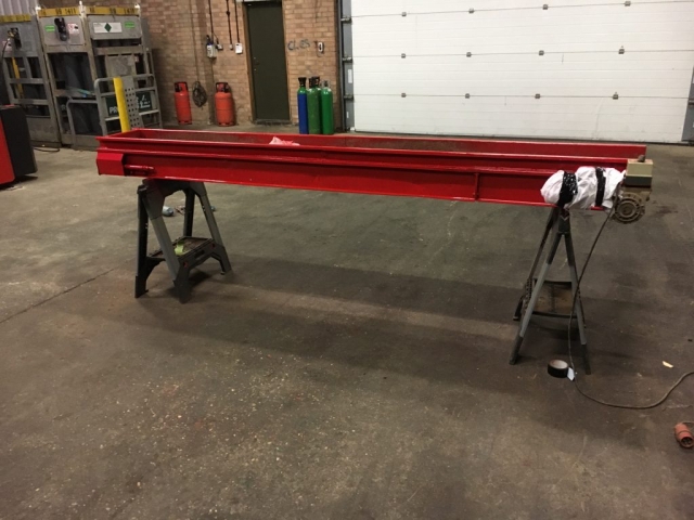 Bent conveyor belt repaired refurbished and straightened